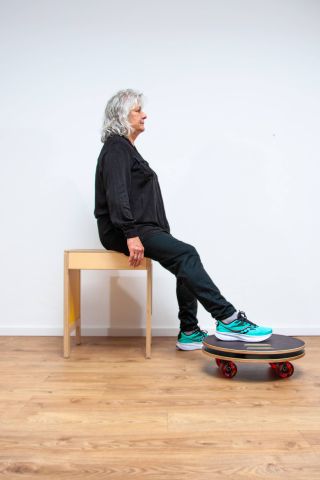 Wexelboard | Übung | Kniemobilisation (sitzend)